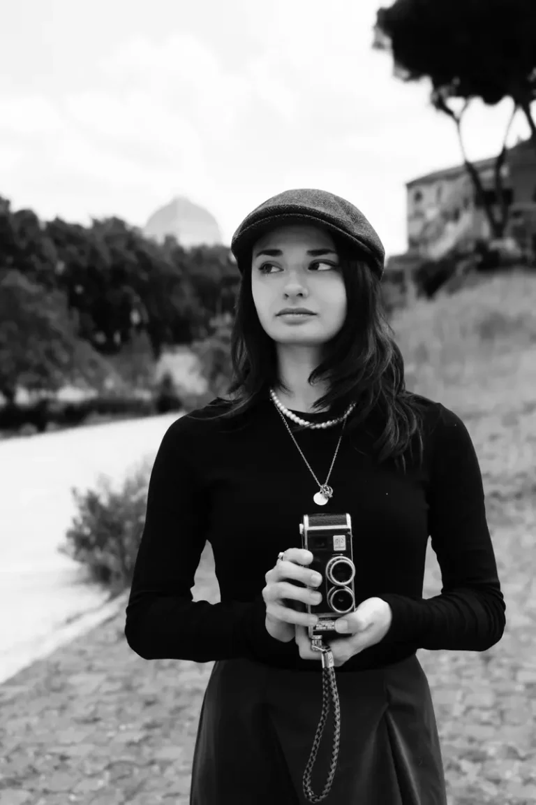 Vintage portrait of a girl and her movie camera by Livio Pepè Sciarria — DOLCE Magazine